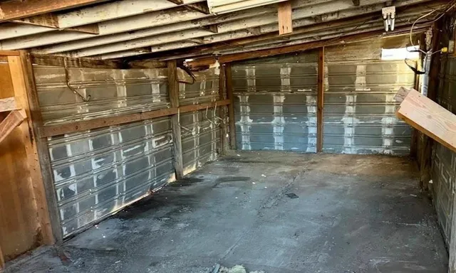 a view of a house with a large window