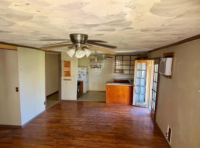 a view of a kitchen with a refrigerator