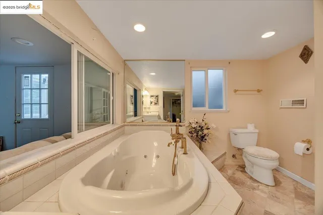 a view of a house with a tree