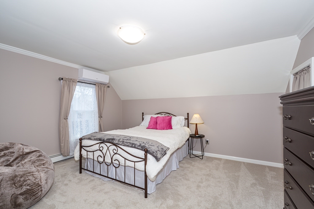 62 Central Street Framingham, MA 01701 - Photo 18 of 35 a bedroom with a bed and window