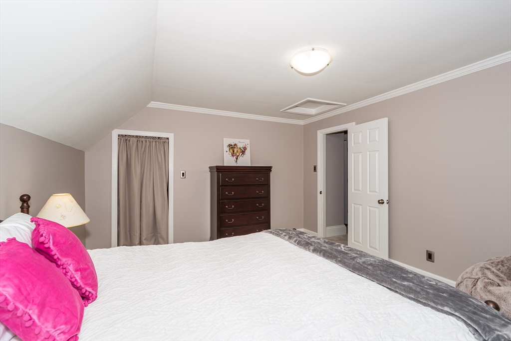 62 Central Street Framingham, MA 01701 - Photo 19 of 35 a bedroom with a bed and a closet