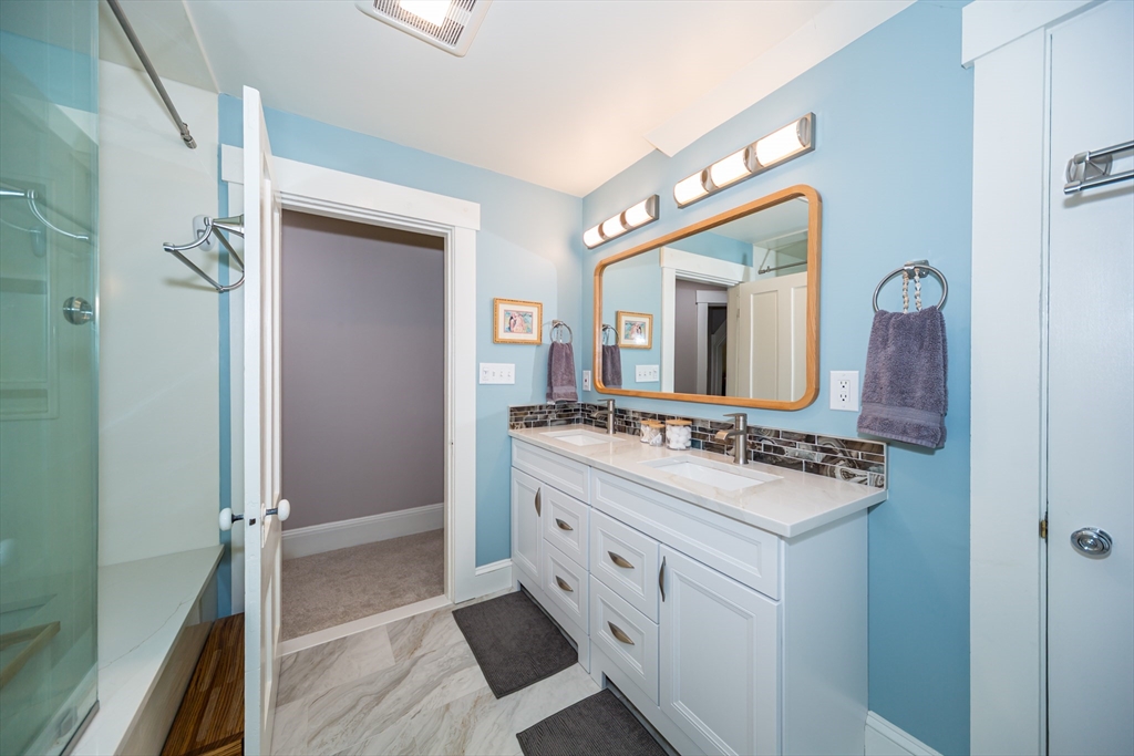 62 Central Street Framingham, MA 01701 - Photo 22 of 35 a bathroom with a double vanity sink mirror and