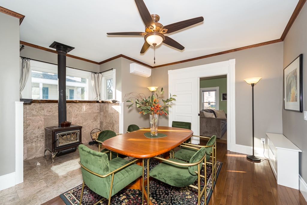 62 Central Street Framingham, MA 01701 - Photo 10 of 35 a living room with furniture a rug and a chandelier