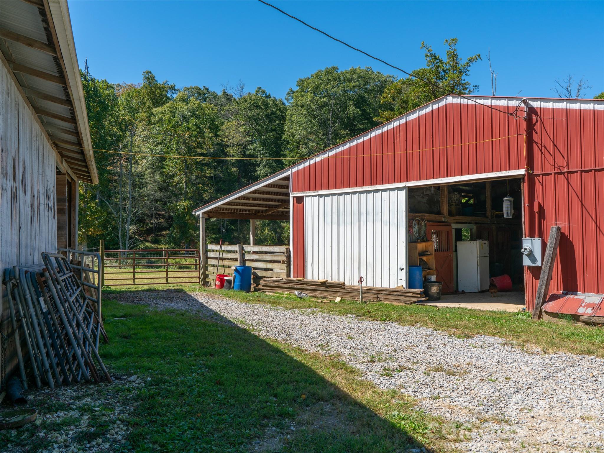1050 Dale Road Spruce Pine, NC 28777 - Photo 6 of 46 a view of a house with backyard and porch