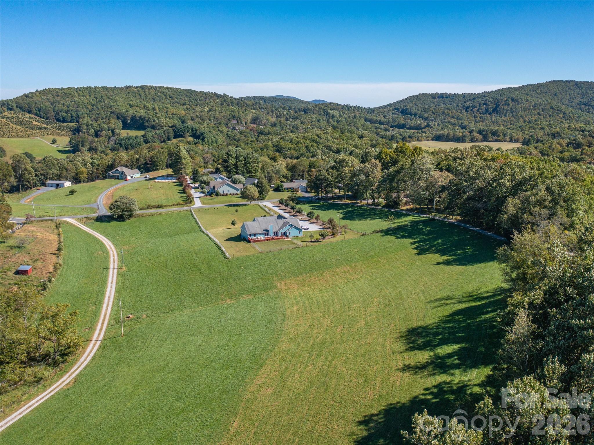 1050 Dale Road Spruce Pine, NC 28777 - Photo 8 of 46 an aerial view of a house with a yard
