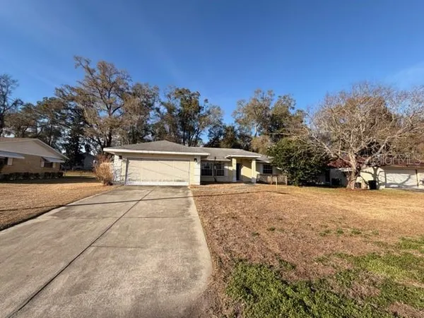 a house with trees in front of it