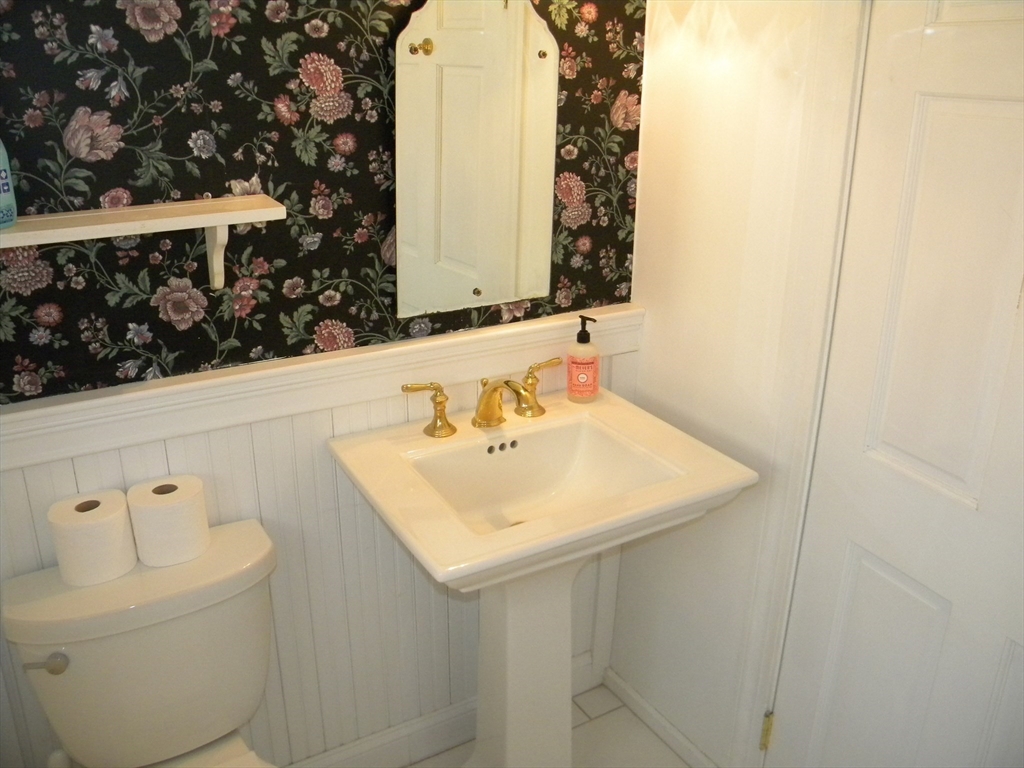 21 Lovers Lane Groton, MA 01450 - Photo 19 of 35 a bathroom with a sink and a toilet