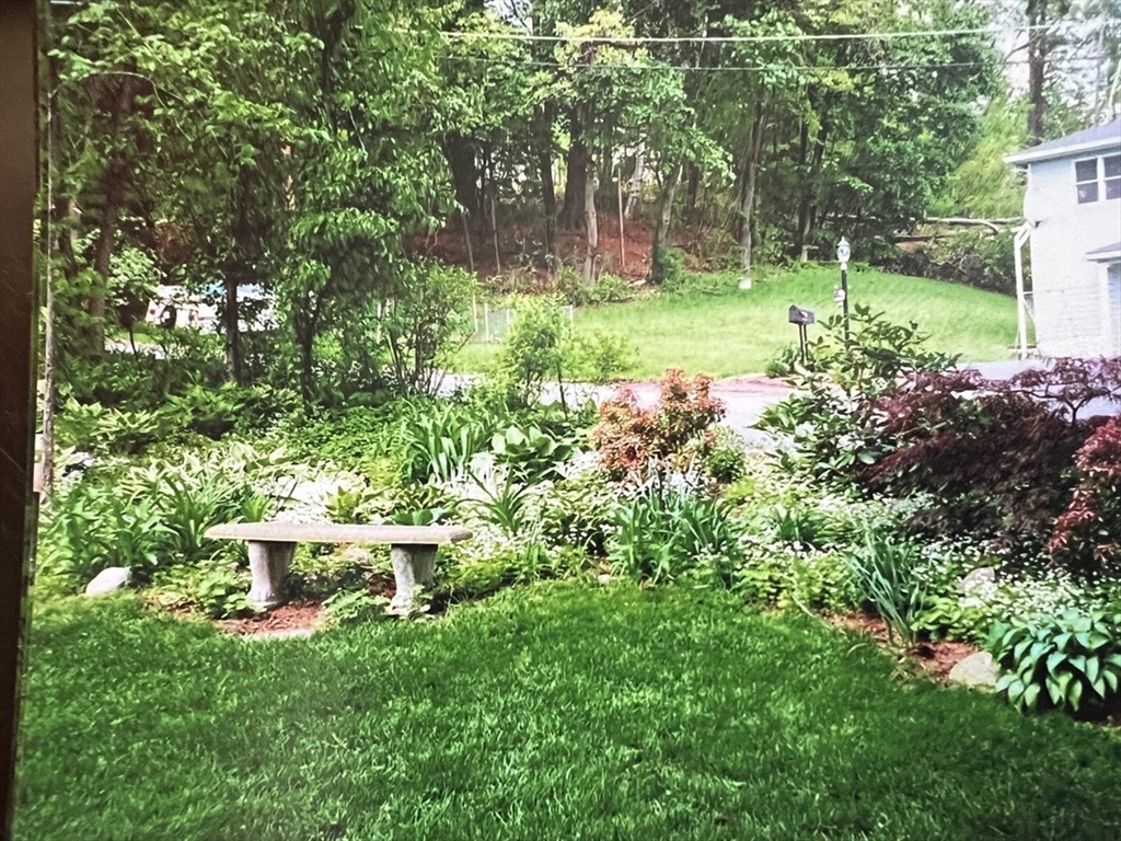 21 Lovers Lane Groton, MA 01450 - Photo 27 of 35 a view of a backyard with garden