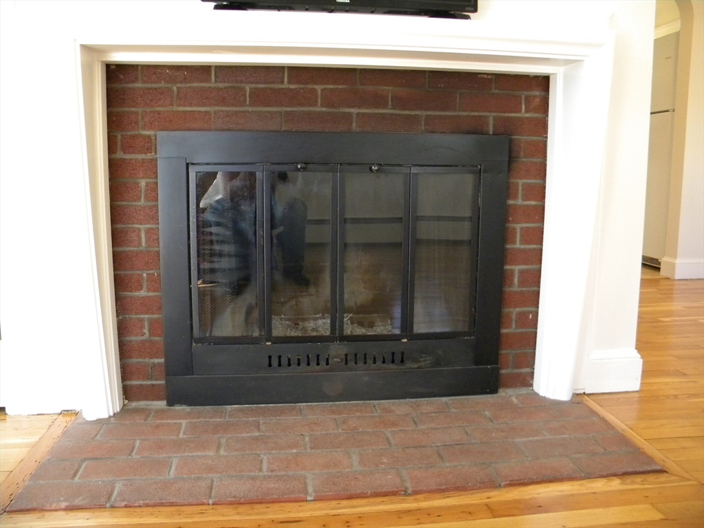 21 Lovers Lane Groton, MA 01450 - Photo 4 of 35 a view of fireplace and window