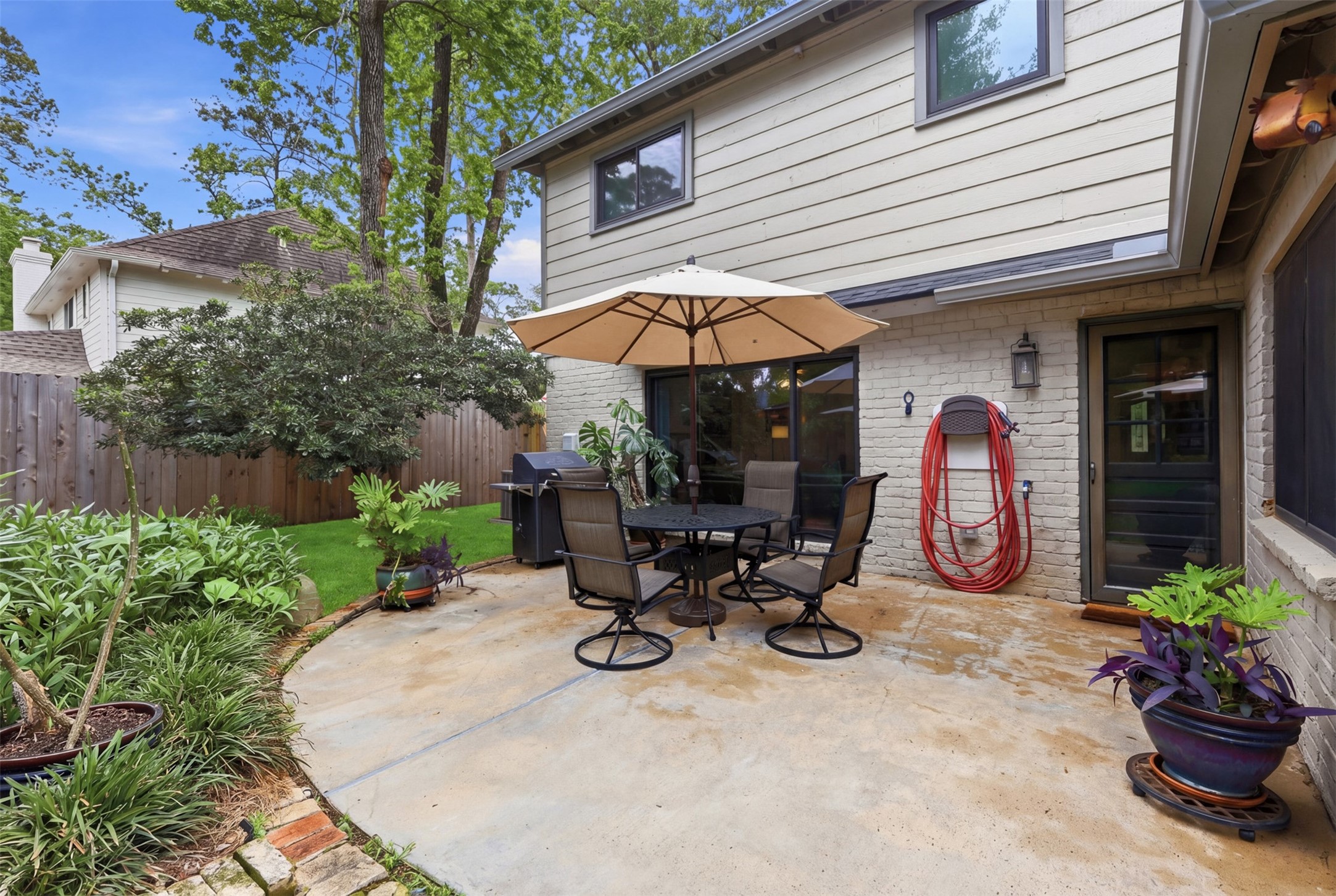 6126 Hickorycrest Drive Spring, TX 77389 - Photo 36 of 50 Patio area with outdoor dining space and direct access to the home.