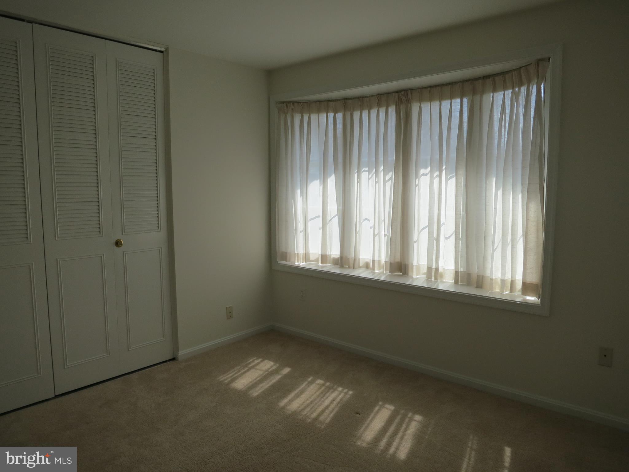 8128 Springfield Village Drive Springfield, VA 22152 - Photo 11 of 15 Main level bedroom 4