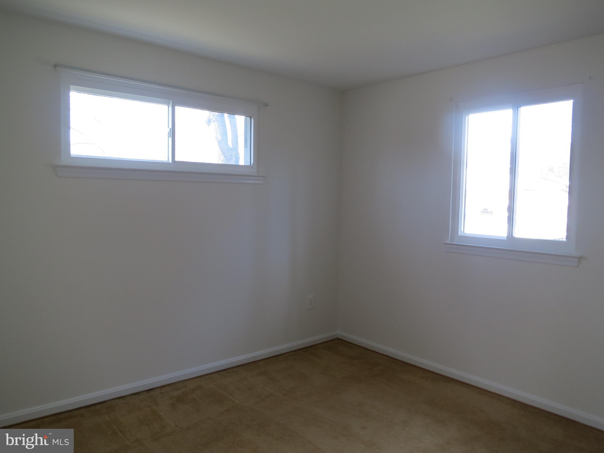 8128 Springfield Village Drive Springfield, VA 22152 - Photo 13 of 15 Main level bedroom 5