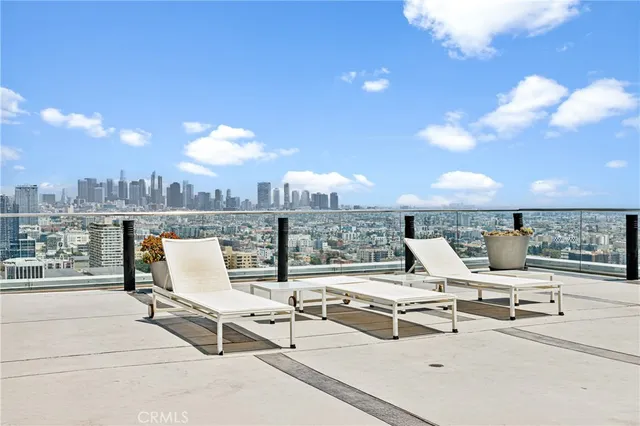 a view of a terrace with chairs