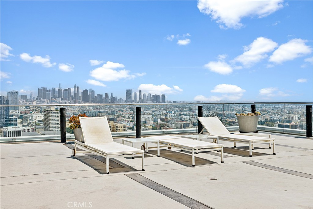 3810 Wilshire Boulevard, Unit 2002 Los Angeles, CA 90010 - Photo 16 of 25 a view of a terrace with chairs