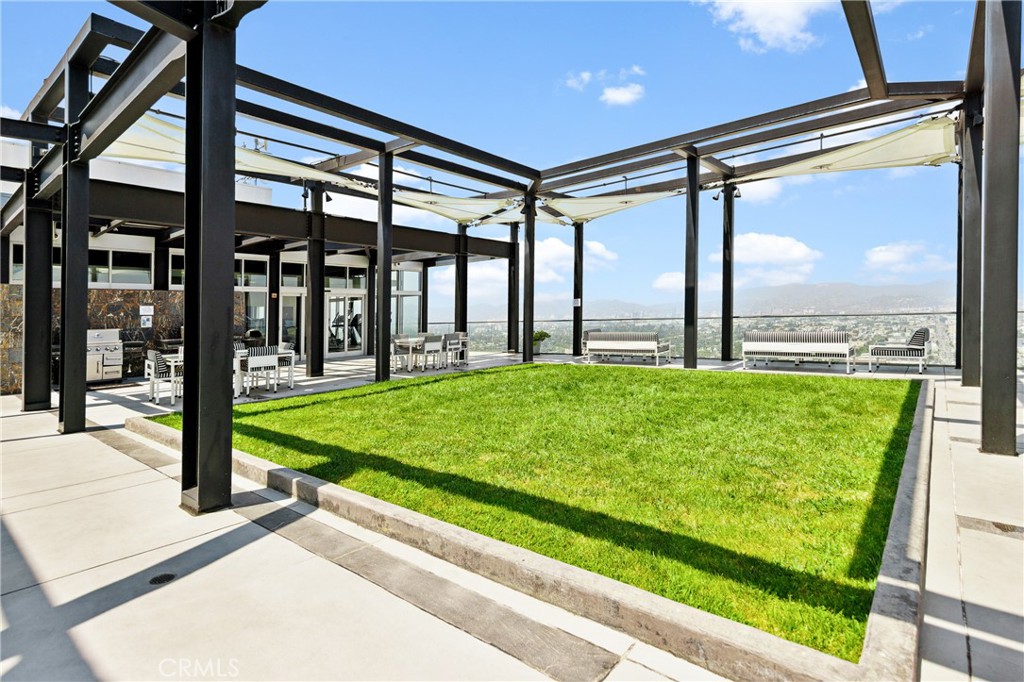 3810 Wilshire Boulevard, Unit 2002 Los Angeles, CA 90010 - Photo 17 of 25 a view of swimming pool with a patio