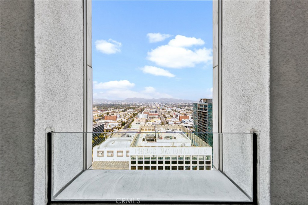 3810 Wilshire Boulevard, Unit 2002 Los Angeles, CA 90010 - Photo 8 of 25 a view of a balcony with an outdoor space