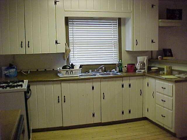 142 East 10th Street Rifle, CO 81650 - Photo 3 of 5 a kitchen with granite countertop a sink cabinets and stainless steel appliances