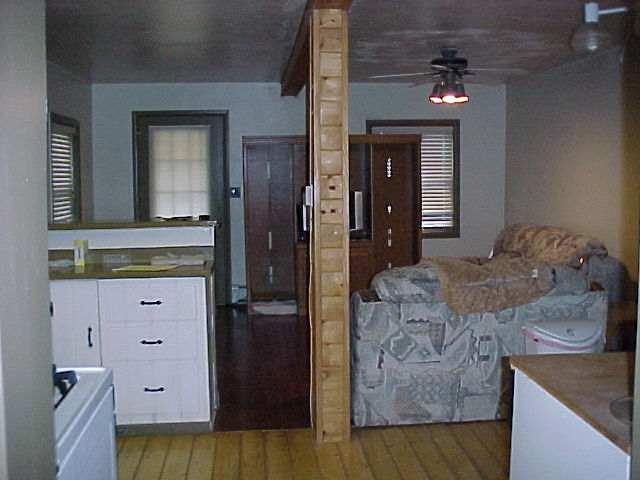 142 East 10th Street Rifle, CO 81650 - Photo 4 of 5 a bedroom with a bed and a dresser