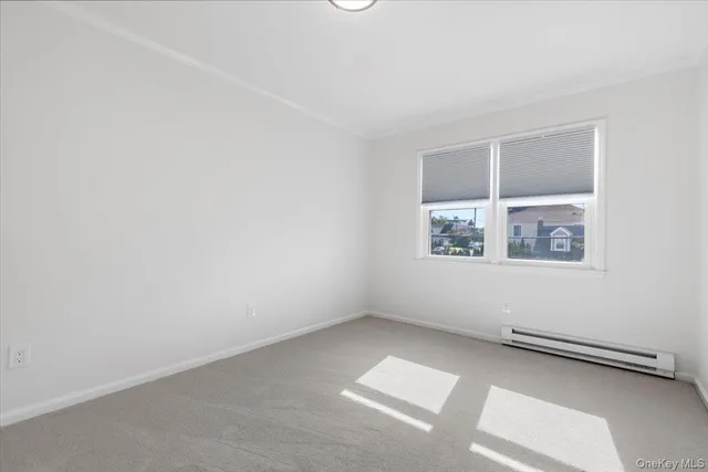 an empty room with a workbench