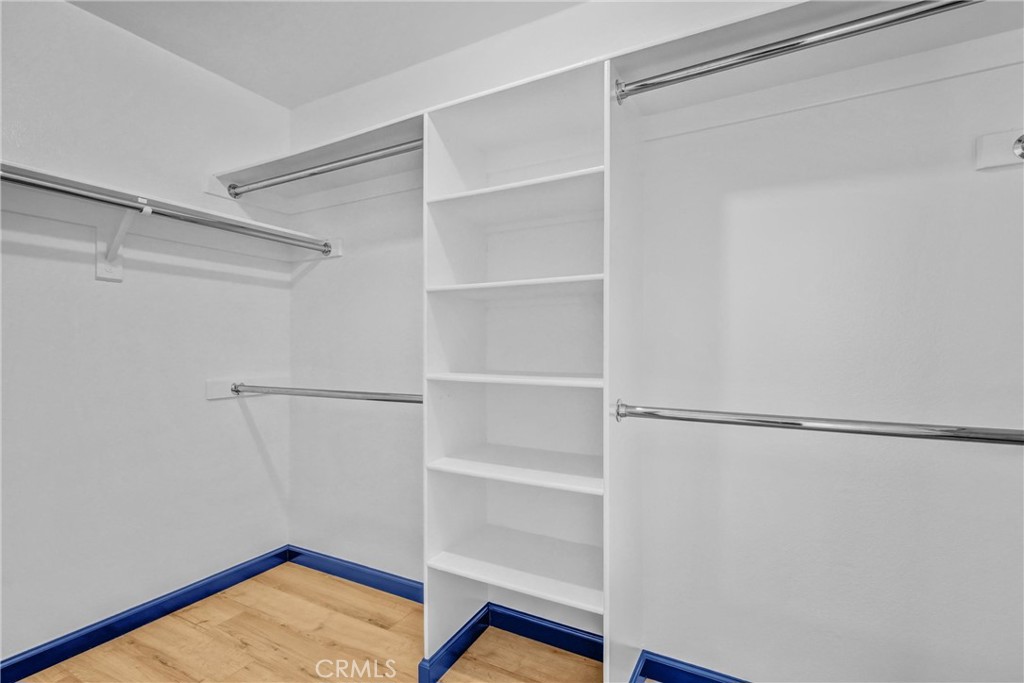217 East Commonwealth Avenue, Unit F Alhambra, CA 91801 - Photo 16 of 25 Walk-in Closet in Primary Bedroom