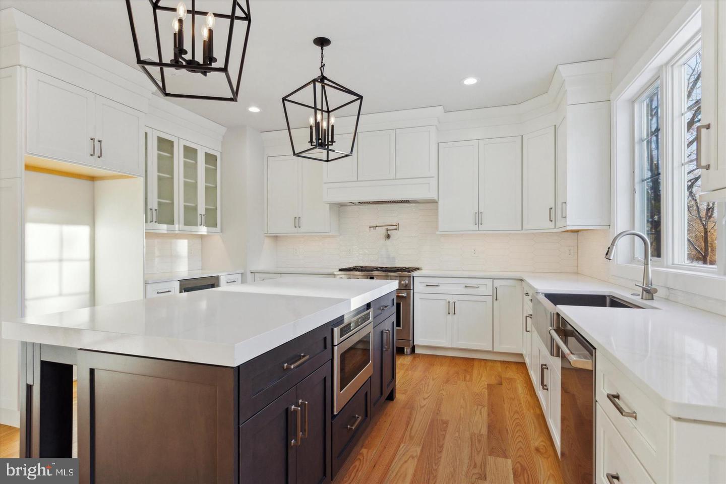 825 Morris Road Lansdale, PA 19446 - Photo 8 of 21 a kitchen with a sink a counter space appliances and cabinets