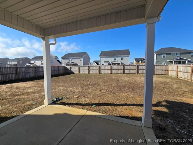 a view of a terrace with yard