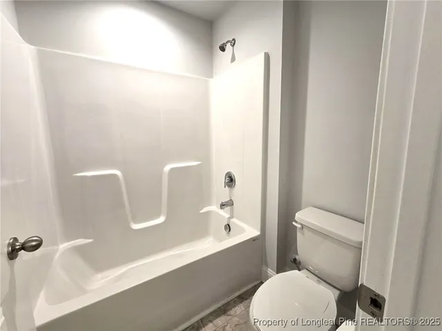 a bathroom with 2 sink and a mirror