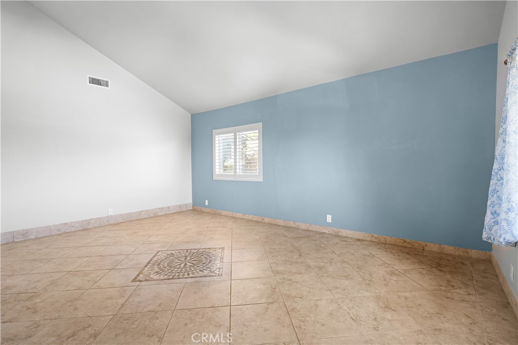 9046 Culpepper Street Rancho Cucamonga, CA 91730 - Photo 9 of 66 Living Room With Cathedral Ceilings