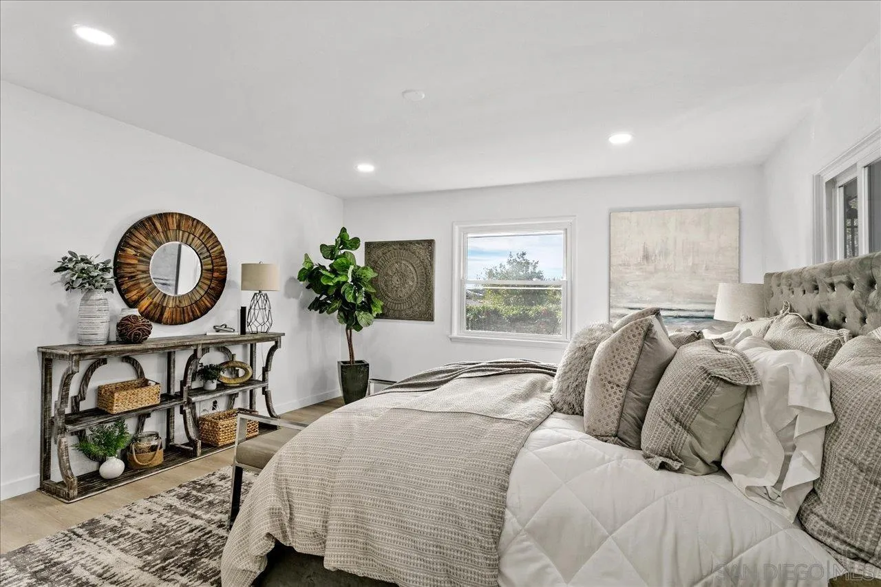 506 Brotherton Road Escondido, CA 92025 - Photo 14 of 31 a bedroom with bed and a window