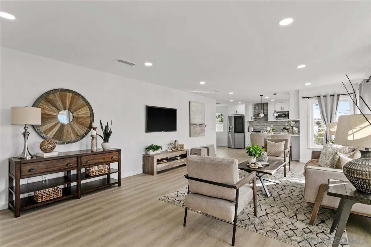 506 Brotherton Road Escondido, CA 92025 - Photo 2 of 31 a living room with furniture and a flat screen tv