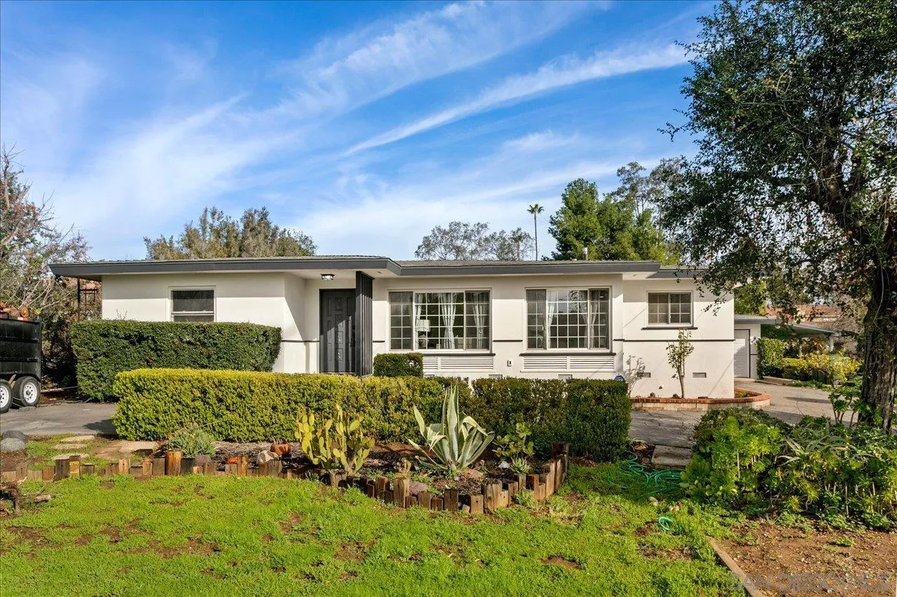 506 Brotherton Road Escondido, CA 92025 - Photo 26 of 31 a view of a house with furniture and garden