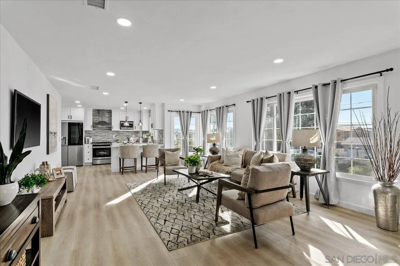 506 Brotherton Road Escondido, CA 92025 - Photo 3 of 31 a living room with furniture and a flat screen tv