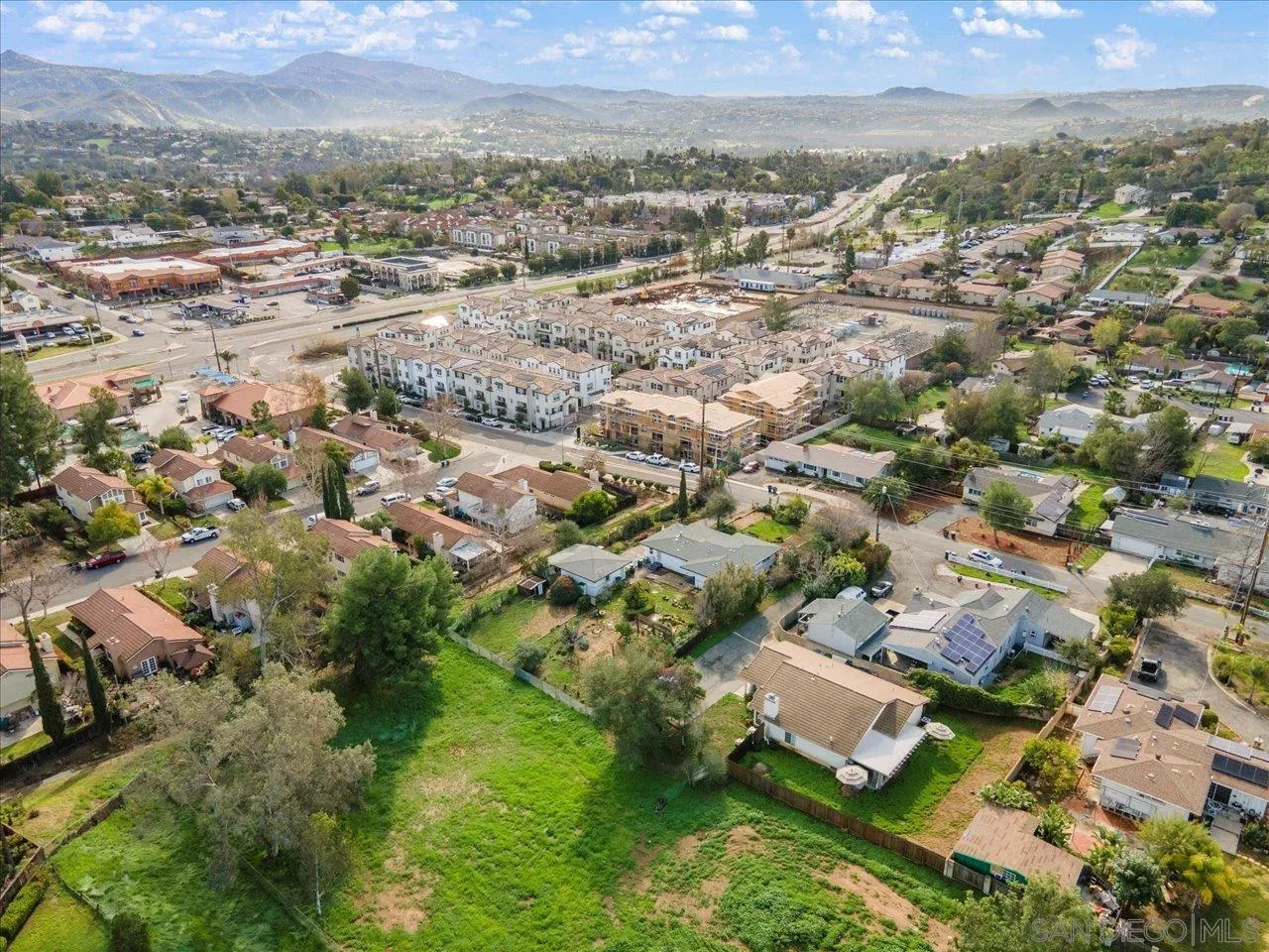 506 Brotherton Road Escondido, CA 92025 - Photo 31 of 31 an aerial view of residential houses with outdoor space and trees
