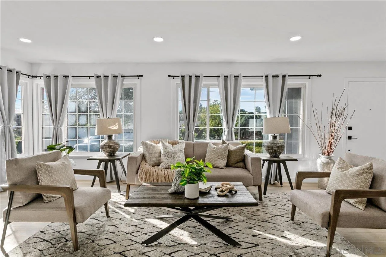 506 Brotherton Road Escondido, CA 92025 - Photo 4 of 31 a living room with furniture and floor to ceiling windows
