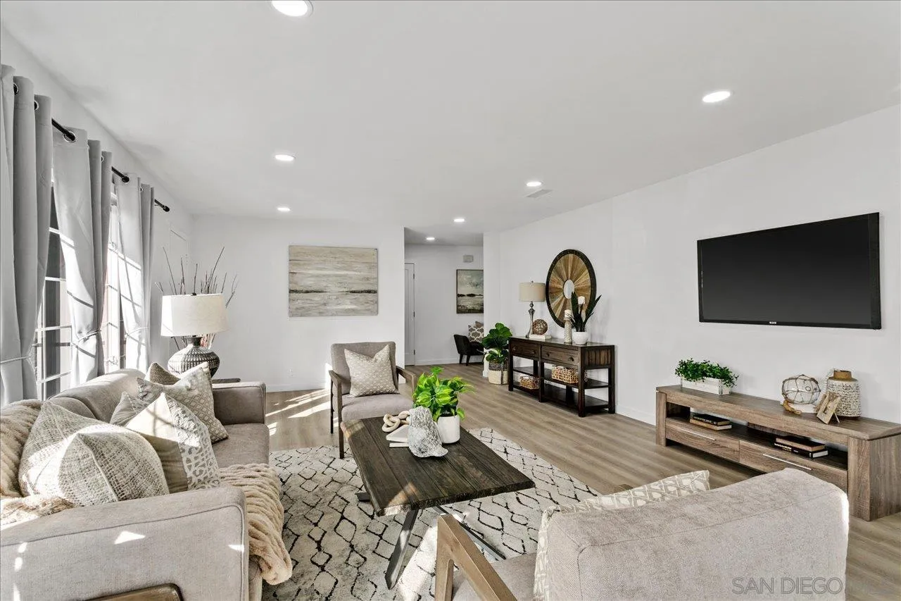 506 Brotherton Road Escondido, CA 92025 - Photo 5 of 31 a living room with furniture and a flat screen tv