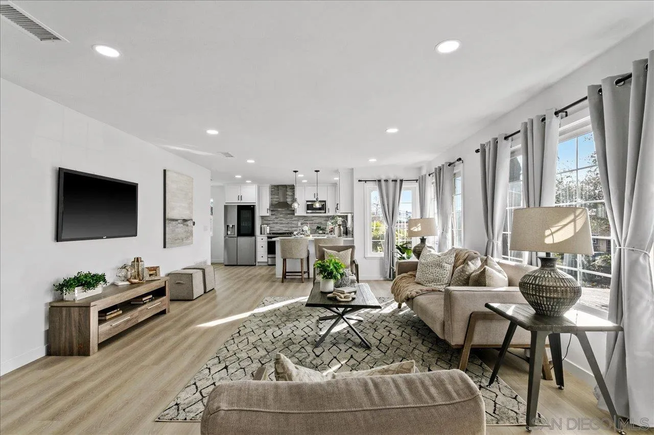 506 Brotherton Road Escondido, CA 92025 - Photo 6 of 31 a living room with furniture and a flat screen tv