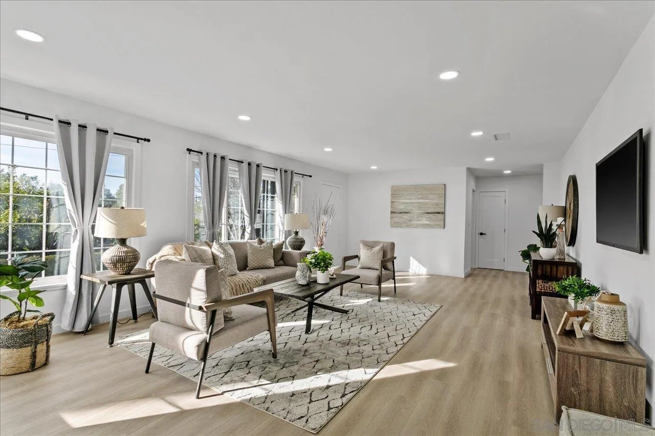 506 Brotherton Road Escondido, CA 92025 - Photo 7 of 31 a living room with furniture and a flat screen tv