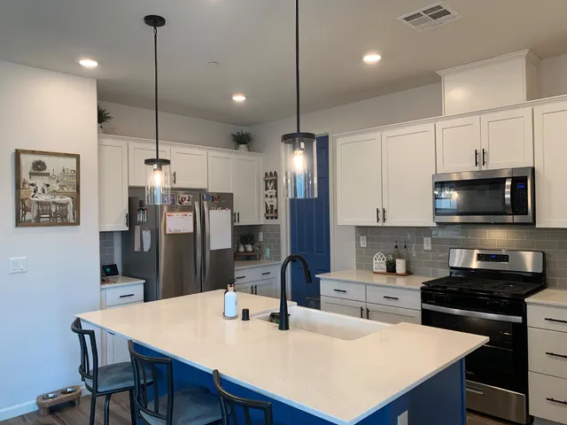 a room with lots of books and a book shelf