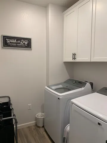 a living room with furniture dining table and a fireplace