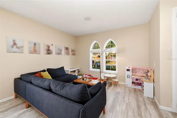 a living room with furniture and a window