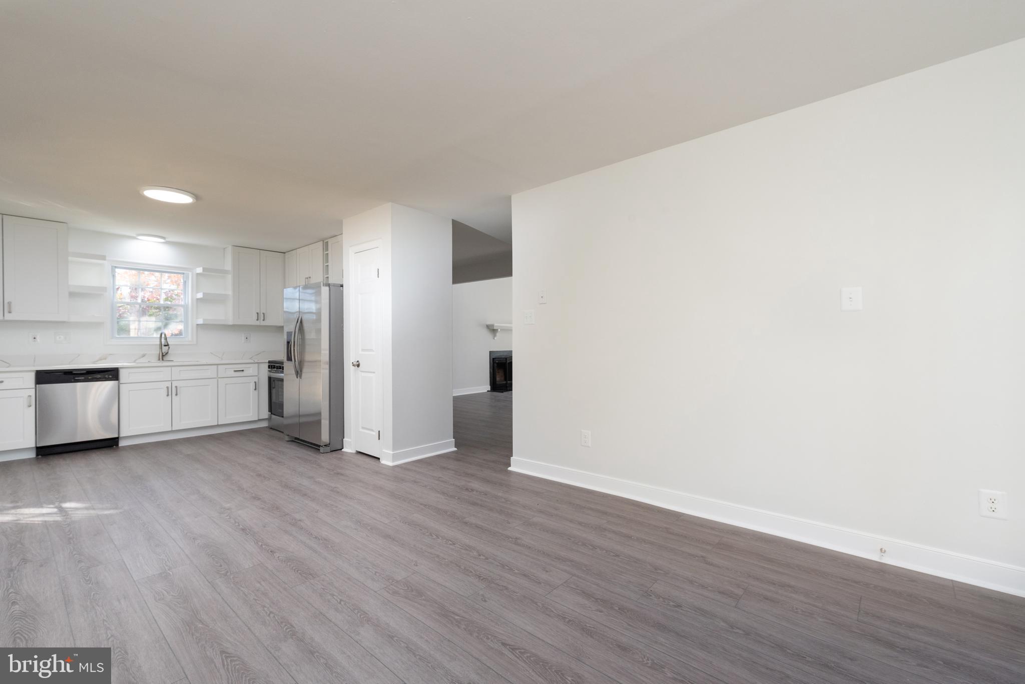1709 Headwaters Road Midlothian, VA 23113 - Photo 23 of 42 a view of a kitchen with a sink and a refrigerator
