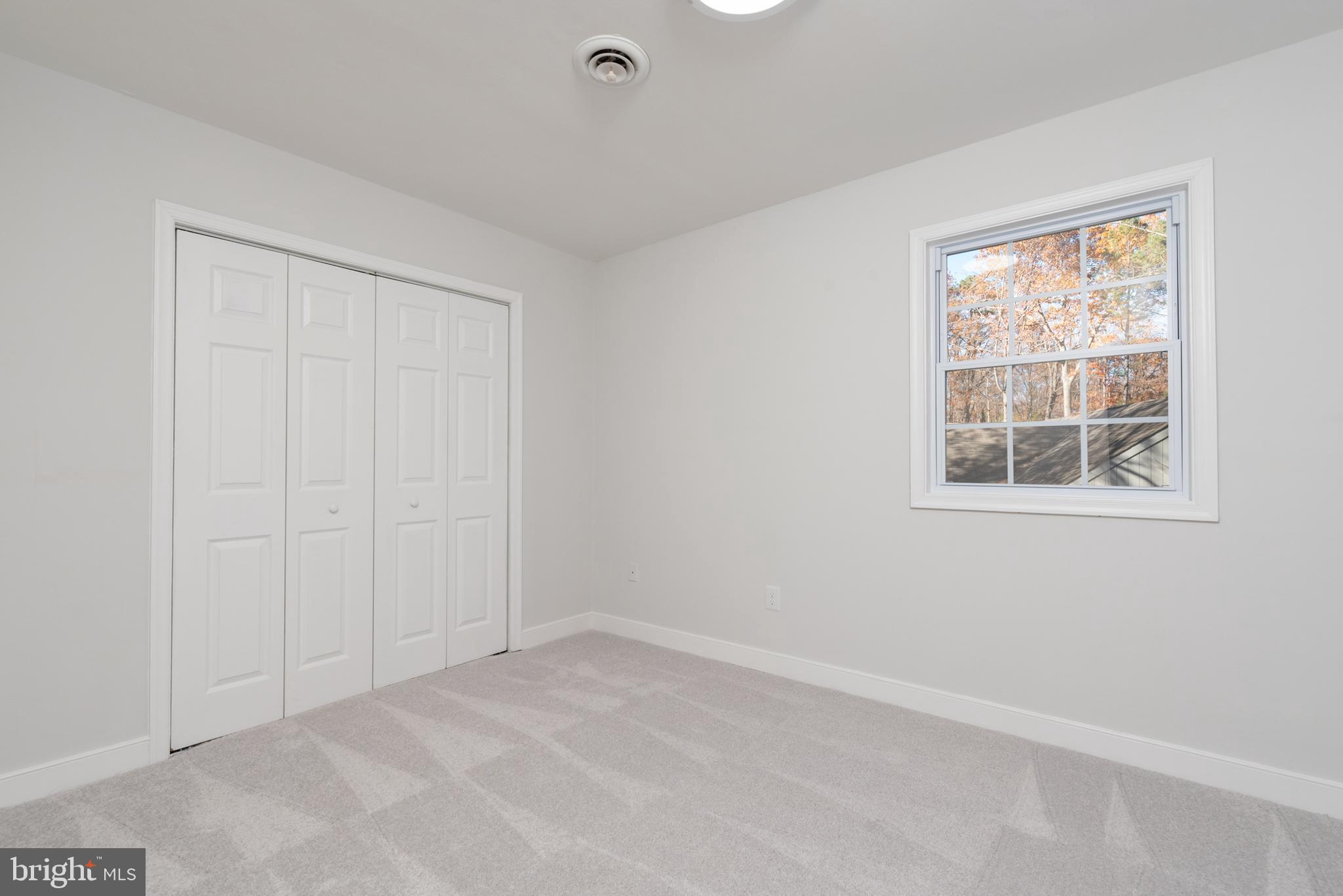 1709 Headwaters Road Midlothian, VA 23113 - Photo 24 of 42 an empty room with windows