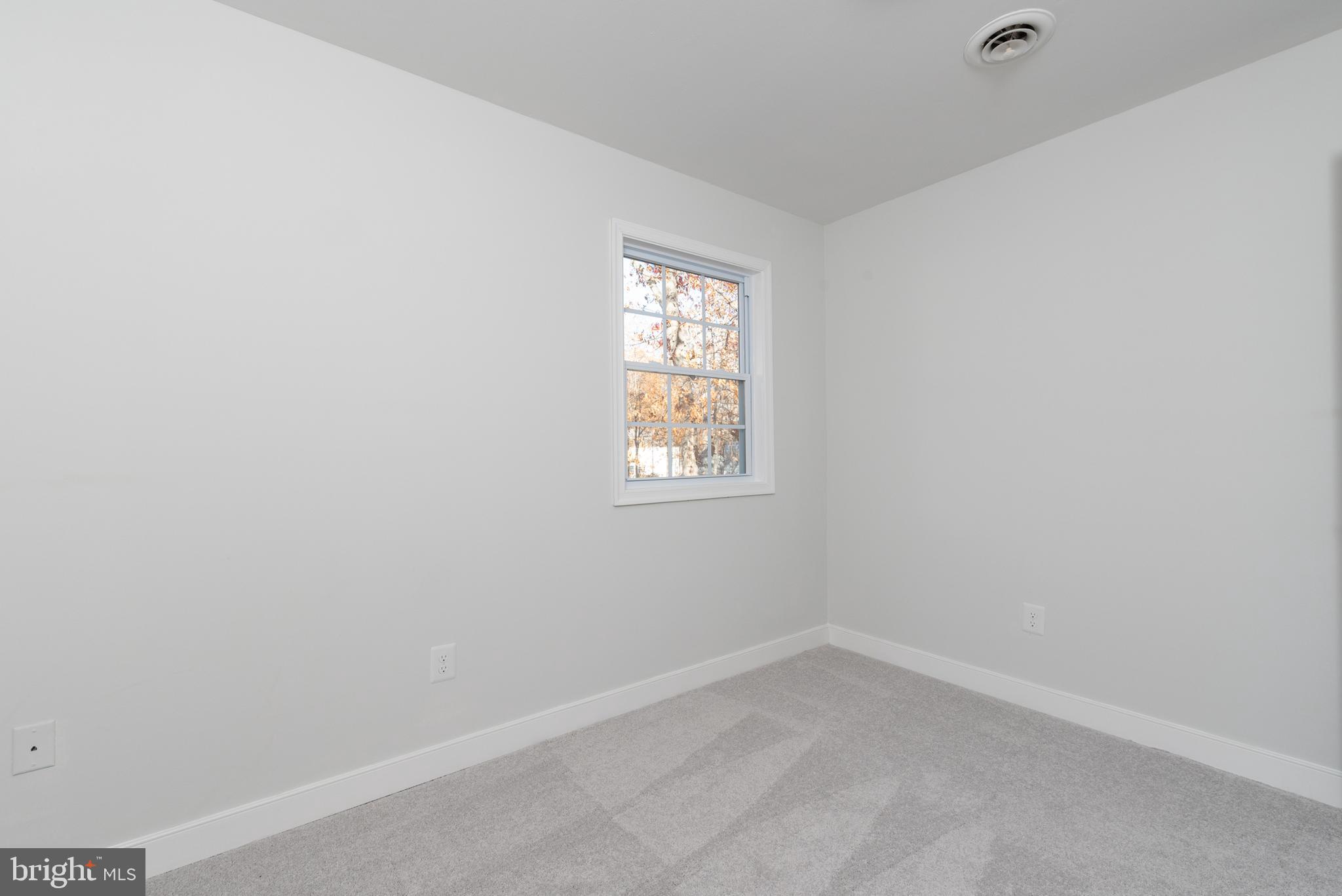 1709 Headwaters Road Midlothian, VA 23113 - Photo 25 of 42 an empty room with a window
