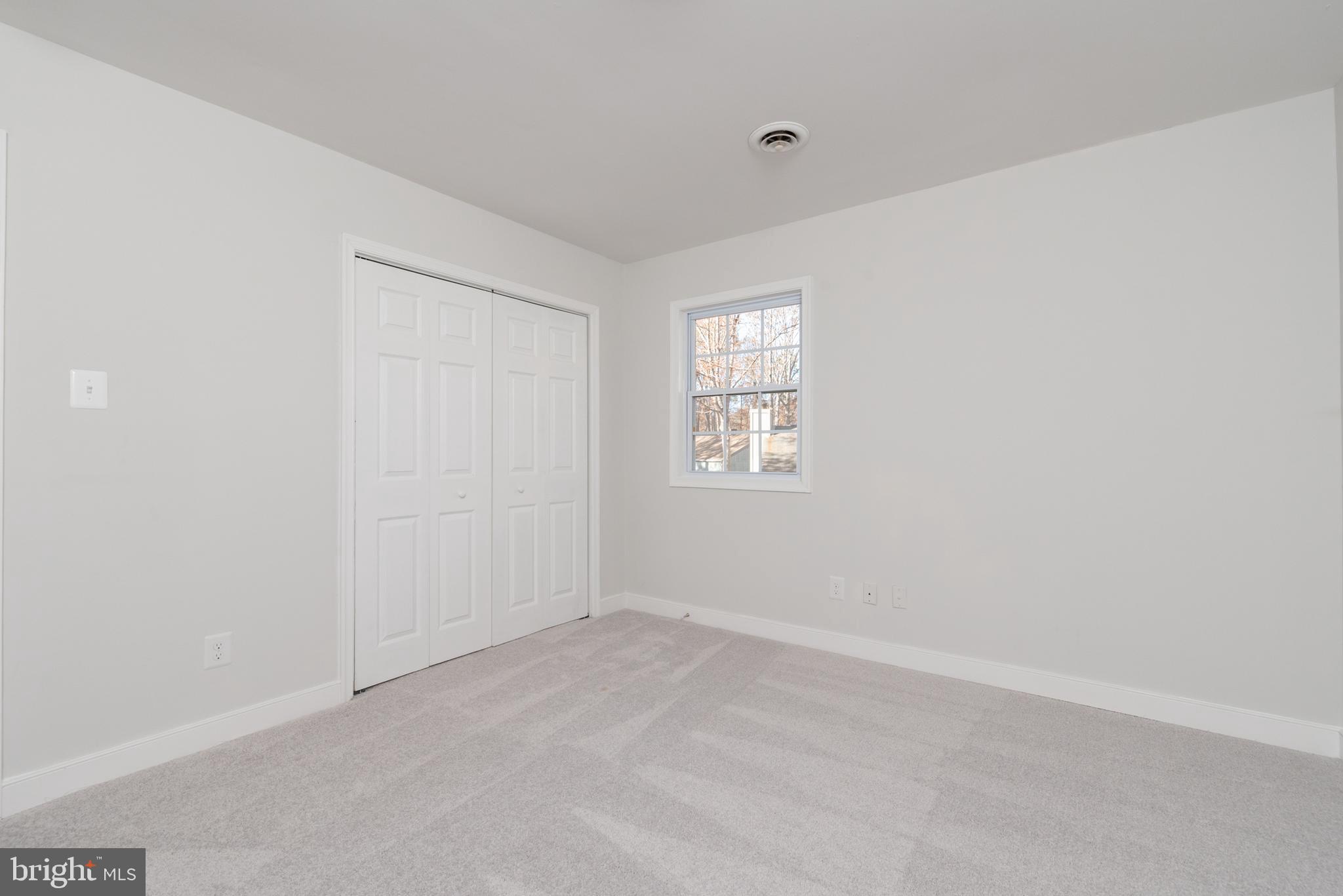1709 Headwaters Road Midlothian, VA 23113 - Photo 27 of 42 an empty room with windows