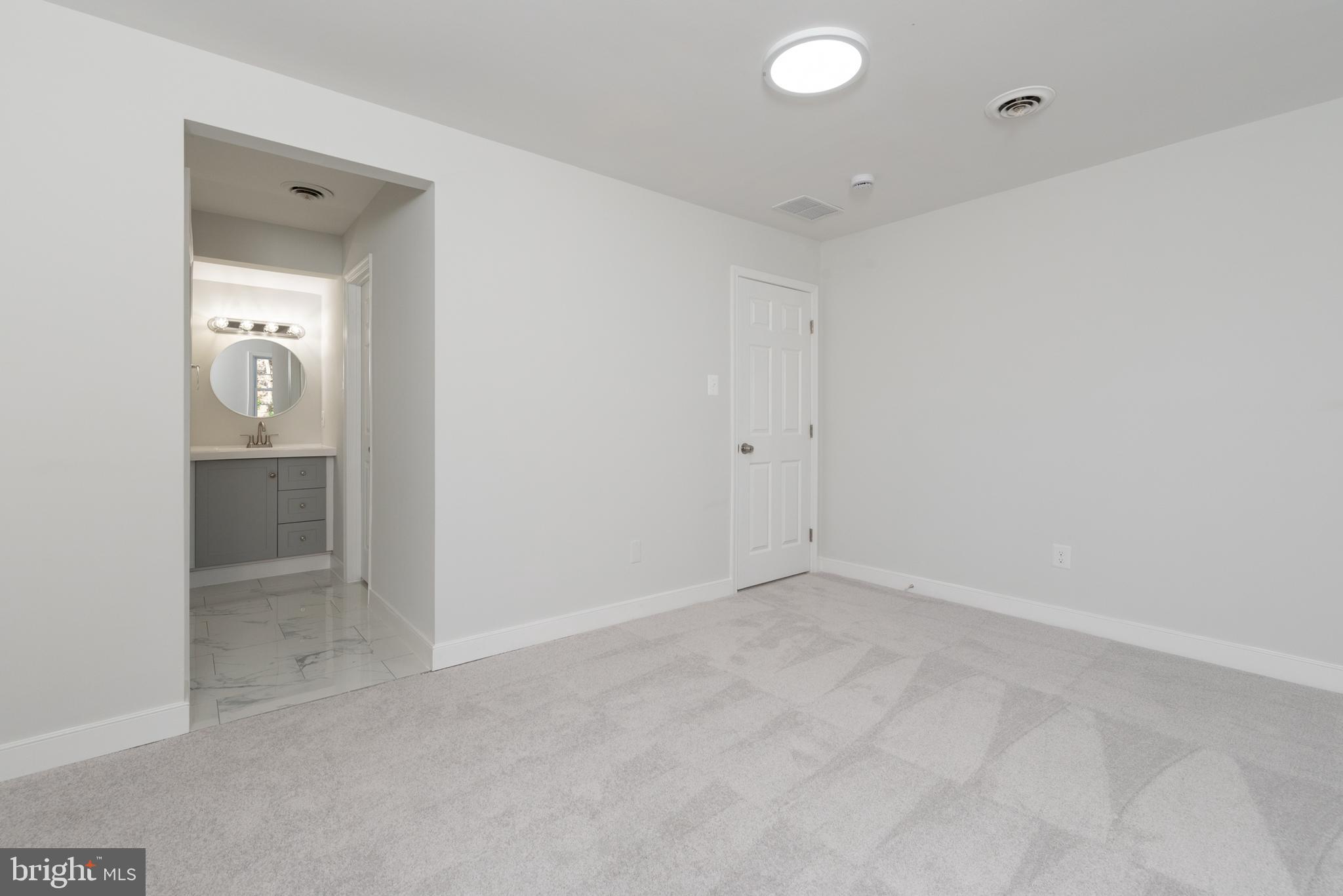 1709 Headwaters Road Midlothian, VA 23113 - Photo 30 of 42 an empty room with closet and windows