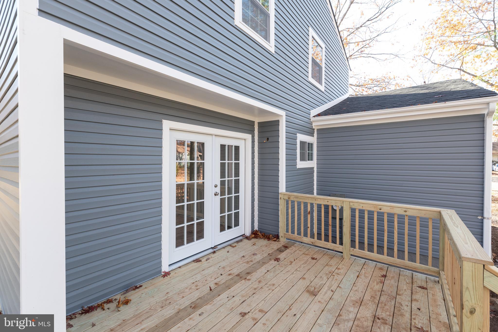 1709 Headwaters Road Midlothian, VA 23113 - Photo 40 of 42 a view of a house with wooden deck