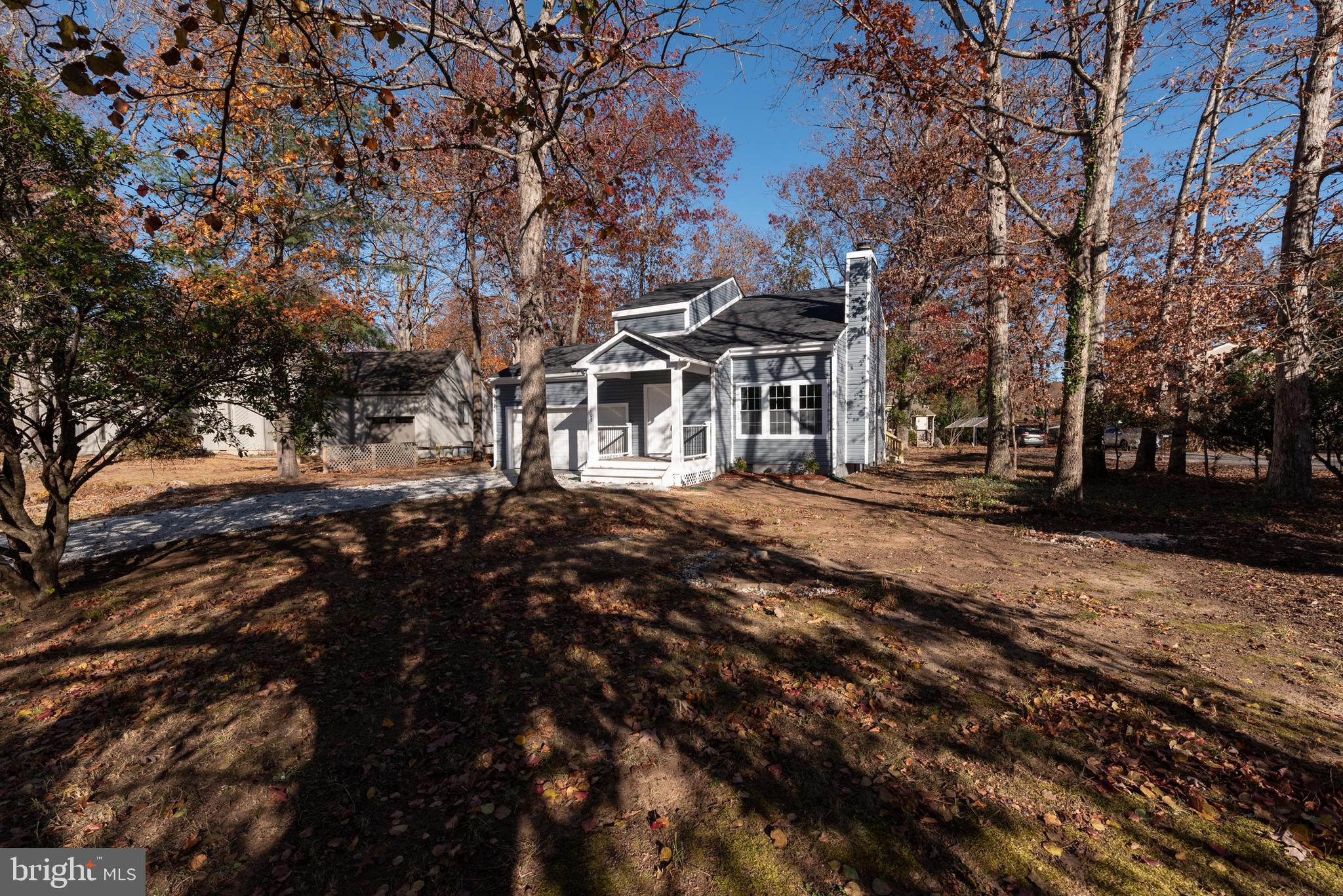 1709 Headwaters Road Midlothian, VA 23113 - Photo 5 of 42 a front view of a building with trees