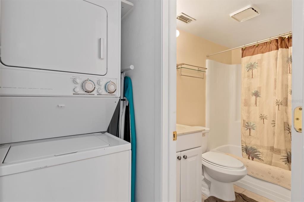 25275 Rampart Boulevard, Unit 202 Punta Gorda, FL 33983 - Photo 18 of 28 a bathroom with a toilet and a shower