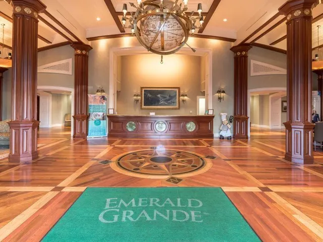 a view of a swimming pool with outdoor seating