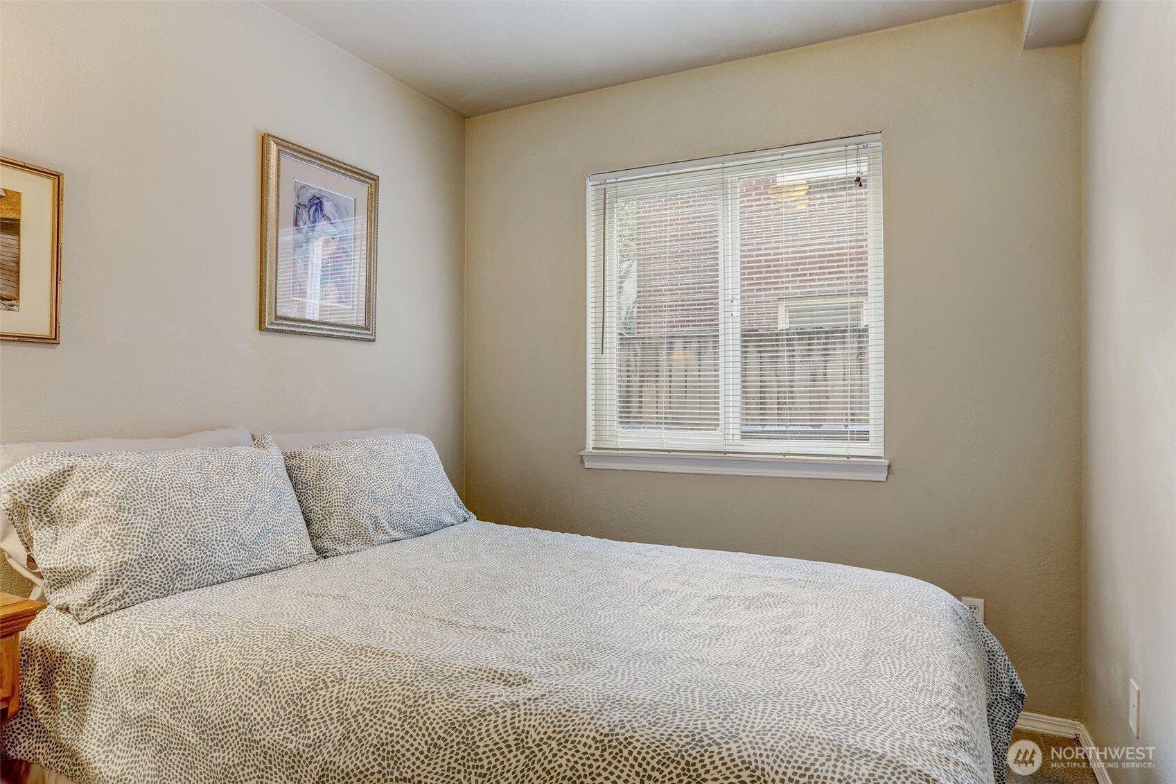 403 East Thomas Street, Unit 19 Seattle, WA 98102 - Photo 9 of 24 a bedroom with a bed and a window